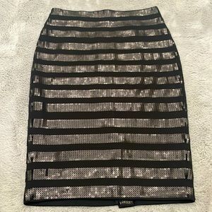 Black lined skirt with black charcoal sequence going across